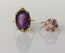 A mixed-cut oval amethyst dress ring with diamond decoration on an 18ct yellow gold claw setting