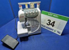A JANOME 9300DX 4-Thread Overlocking Machine with Treadle Operation
