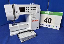 A BERNINA B335 Electric Sewing Machine with Treadle Operation
