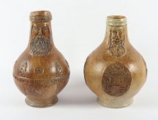 zwei Bartmannskrüge, Steinzeug, rest., Frechen, 16.Jh.