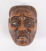 Netsuke einer No-Maske, Buchsbaum, Japan, 19.Jh.