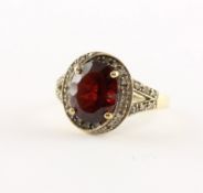 Granatring, 333/ooo Gelbgold, geprüft, 3g