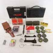 Holster, ammunition, cleaning kits, laser sight