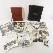 WWII scrapbooks with photos and news clippings