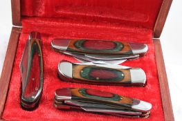 4 Folding Knives in Wooden Case Unbranded