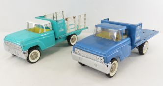 2 Structo Cattle Farms Flatbed Stake Trucks