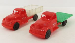 2 Curtiss Candy Plastic Trucks