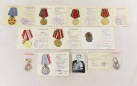 Collection of Named Soviet Medals with Documents