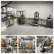 Used Filamatic Pro Line Series 2-Head Filling Line, speeds up to 60 bottles/minute. Model Econofil