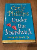 Under the Boardwalk (Costas Sisters, Book 1) by Phillips, Carly, Good Book