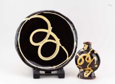 † DYLAN BOWEN (born 1967); a slip decorated earthenware bottle, painted signature, height 18cm,