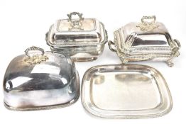 Two 19th century silver-plated tureens and covers, largest approximately height 25cm, length 31cm,