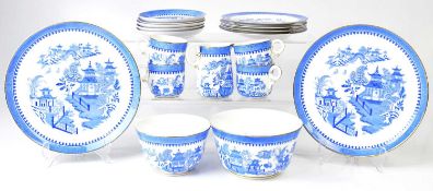 ROYAL WORCESTER; a blue and white 'Willow' pattern part tea service comprising cups, saucers, side
