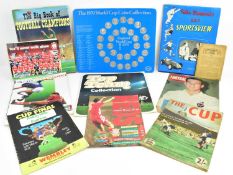 Various football programmes of different ages, including a 1994 Reds Anfield Review with ballpoint