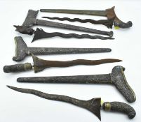 Four antique Indonesian/South East Asian kris daggers, the four keris are possibly ceremonial and
