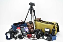 Various cameras including a Edixa Prismat, in leather case, a light meter, a lens cover, a