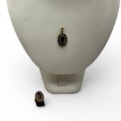 14 karat rose gold ring and pendant with garnets