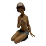 Porcelain LladrÃ³ figure: nude beauty with rose