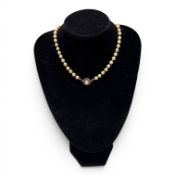 Pearl necklace with white gold clasp