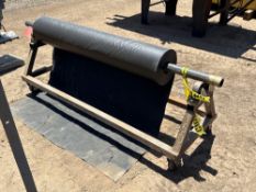 WHEEL MOUNTED ROLLER FRAME WITH A ROLL OF PLASTIC SUPPORT EQUIPMENT