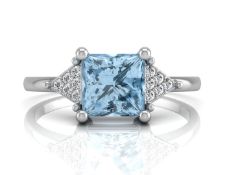 9ct White Gold Diamond And Blue Topaz Ring
