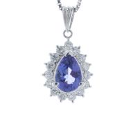 Platinum Pear Cluster Claw Set Diamond And Tanzanite Pendant And Chain (T1.55) 0.60 Carats