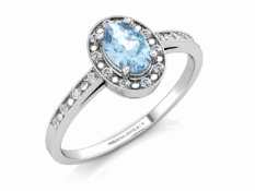 9ct White Gold Oval Cluster Diamond And Blue Topaz Ring (BT0.58) 0.09 Carats