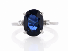 Platinum Oval Cut Sapphire And Diamond Ring (S3.63) 0.08 Carats