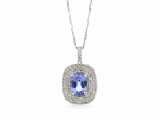 9ct White Gold Oval Tanzanite And Diamond Cluster Pendant 0.28 Carats