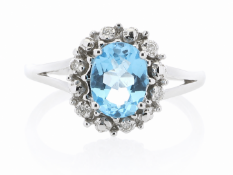 9ct White Gold Blue Topaz Diamond Cluster Ring (BT1.43) 0.04 Carats