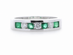 9ct White Gold Channel Set Semi Eternity Diamond And Emerald Ring (E0.20) 0.25 Carats
