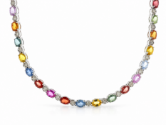This unique necklace features a pattern of natural coloured oval sapphires each measuring approx.