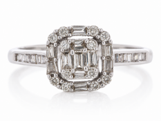 Five baguette cut diamonds and four round brilliant cut diamonds create a centre square shape