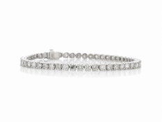 Forty round brilliant cut diamonds are set in this stunning tennis bracelet. 7 inches in length.Item