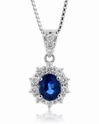 Platinum Oval Cluster Claw Set Diamond And Sapphire Pendant And Chain (S1.46) 0.60 Carats