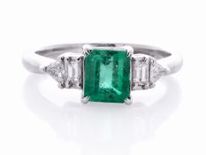 Platinum Ladies Dress Diamond And Emerald Ring (E1.13) 0.50 Carats