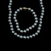 Perlen Set, 2 Teile, bestehend aus Armband und einer Kette, 375/9K Gelbgold (je punziert), Gesamtge