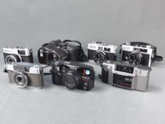 Konvolut 7 Kameras, bestehend aus Minolta "AF-E", Olympus "AZ-330 Superzoom", Olympus "Trip 35", Ol