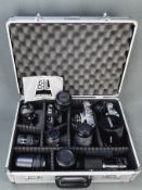 Konvolut Kameras, 2 Kameragehäuse Nikon FG 20 und Nikon EL, 2 Kameras: Canon FTb mit Objektiv FD 50