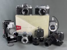 Konvolut Leitz, 7 Teile, bestehend aus 3 Kameras mit Objektiv: Contaflex (2), Icarex 35 CS (1), Obj