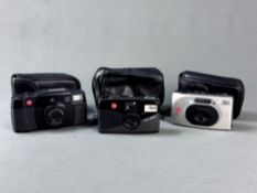 Drei Leica-Kameras, Kleinbild, bestehend aus Leica Mini 200m mit Objektiv Vario Elmar 35-70, Leica