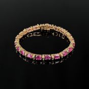 Rubin Armband, 585/14K Gelbgold (punziert), Gesamtgewicht 13,77g, besetzt mit 22 Rubinen, Steckschl