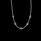 Collier, 750/18K Gelbgold (punziert), Gesamtgewicht 4,18g, Kette mit 5 ovalen, blauen Steinen, wohl