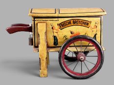 Modell eines Brötchenwagens, Holz und Metall, bemalt, Maße ca. 27,5x40x26cm, Gebrauchsspuren, anbei