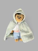 Miniatur Teddy, Anfang 20. Jahrhundert, Mohair, schwarze Knopfaugen, bewegliche Glieder und Kopf, H