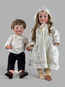 Zwei Puppen, Kämmer & Reinhardt, bestehend aus Puppenjunge, um 1950, am Hinterkopf mit sechszackige