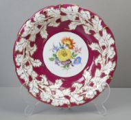 Meissen Prunkteller, purpur mit Blumenmalerei