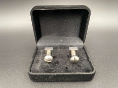 NJI, A MODERN PAIR OF NUT & BOLT CUFFLINKS