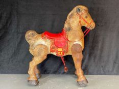 MOBO, MID 20TH CENTURY PRESSED AND PAINTED STEEL WALKING HORSE TOY