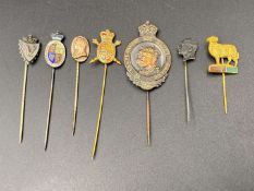 EIGHT VARIOUS SILVER AND BASE METAL STICK PINS